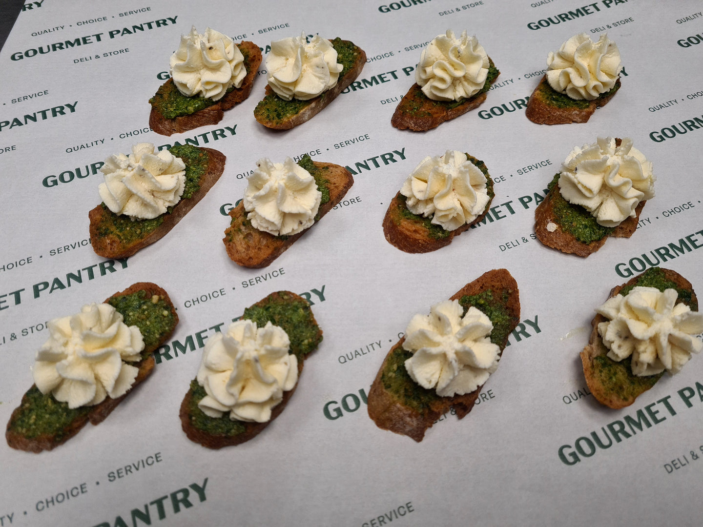 12 Ardsallagh Goats Cheese, Basil & Rocket Pesto on Crostini