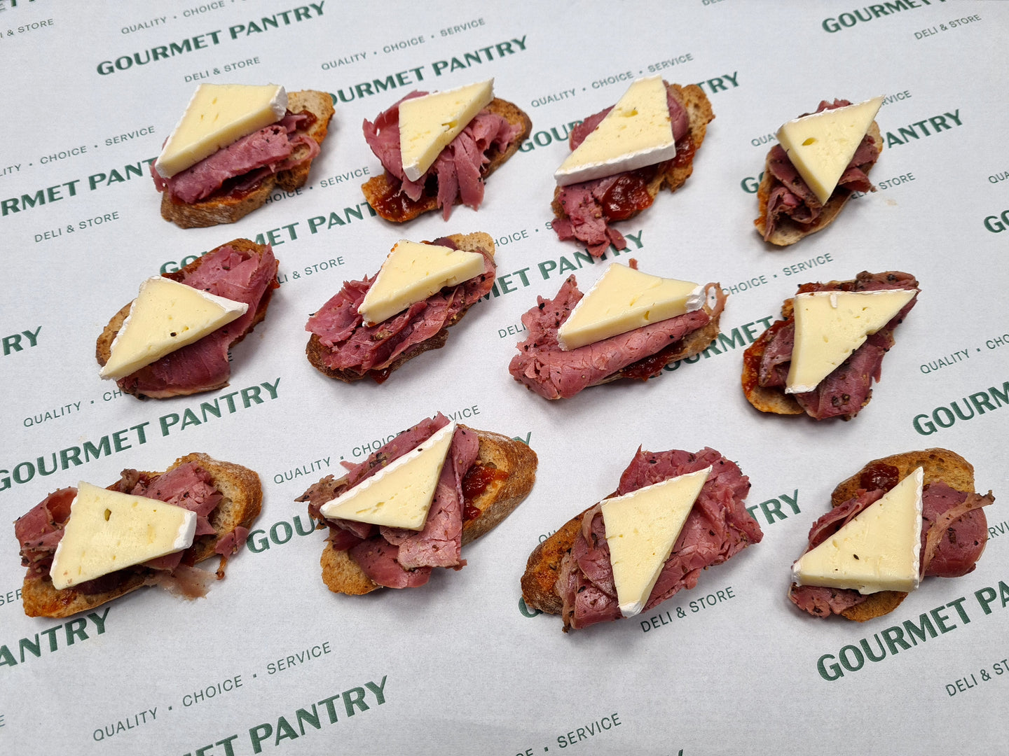 12 Pastrami Brie and Relish Crostini